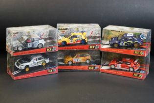 Six cased SCX 1:32 Scale Racing System slot cars, to include 60010 Mitsubishi Lancer "Ancap" (