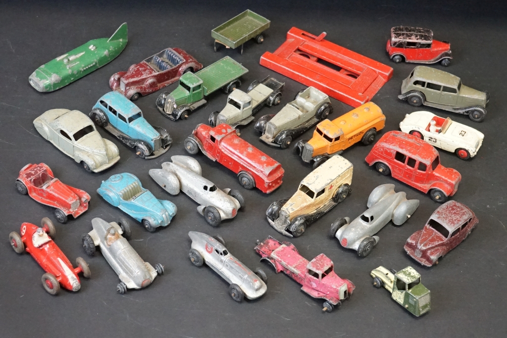 Around 25 early-mid 20th C play worn diecast models to include road, commercial and racing examples
