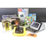 Retro Gaming - Eight handheld consoles to include boxed Grandstand Mini Munchman, boxed