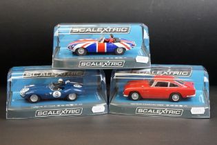 Three cased Scalextric slot cars to include C3722 Aston Martin DB5 red, C3730 Jaguar D Type