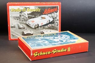 Two boxed Schuco Studio clockwork tin plate model kit sets to include Studio III Bausatz
