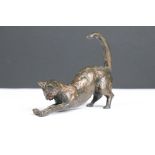 Bronze figurine of a stretching cat