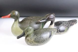 Three painted wooden decoy ducks, largest approx 41cm long