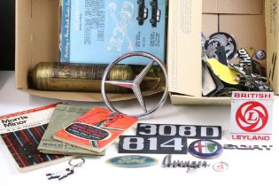 A collection of car manufacturers badges to include Mercedes, Rover, Ford, Leyland...etc..