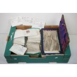 Quantity of assorted used world stamps in Atlas stamp approvals stamp books. Most dating from the