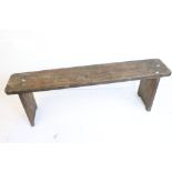 Early 20th century Pine Bench raised on solid stile supports, 139cm long x 49cm high