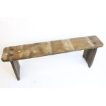 Early 20th century Pine Bench raised on solid stile supports, 137cm long x 49cm high