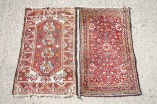 Two small Eastern Wool Rugs, 128cm x 75cm and 127cm x 79cm