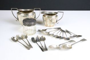 A fully hallmarked sterling silver cream jug and sugar bowl together with a quantity of sterling