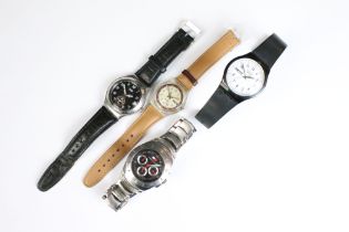 A collection of three gents Swatch wristwatches to include an Irony example together with a Tommy