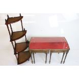 Nest of Three Table with red leather inset tops and glass covers, largest table 76cm long x 48cm