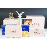 Group of Nao figurines to include a seated lady with swan, three other boxed swan figurines and