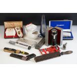 A collection of shaving related collectables to include cut throat and electric examples together