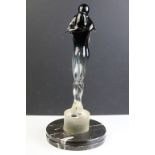 Murano Venetian glass sculpture in the form of two embracing figures raised on a cylindrical glass