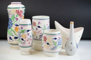 Collection of Poole Pottery ceramics to include four vases each having a white ground with painted