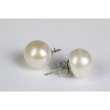 A pair of large freshwater pearl studs on silver posts