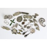 A collection of mixed sterling silver jewellery to include tie clip, necklaces, pendants,