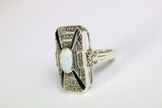 A substantial silver marcasite art deco style ring with opal panel