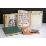 A small collection of British, Commonwealth and world stamps contained within four albums together