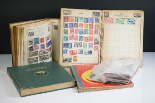 A small collection of British, Commonwealth and world stamps contained within four albums together