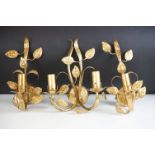 Three gilt foliate design candelabra wall sconces to include one with two branches and two with
