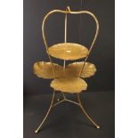 Mid century Gilt Metal Cake or Plant Stand of Art Nouveau design, the two tiers in the form of