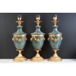 Set of three 'L'Originale' Italian gilt metal & marble table lamps, of urn form, with floral