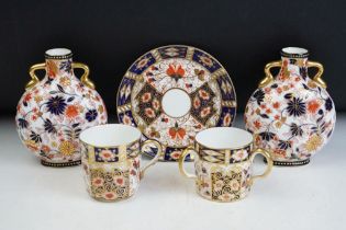 Group of Imari ceramics to include Royal Crown Derby three handled loving cup, two Coalport Imari