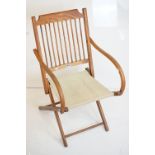 Late 19th / Early 20th century Beech Folding Campaign style Chair with canvas seat, 50cm wide x 85cm