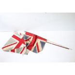 Two vintage cloth Union flags, with poles (measure approx 78cm x 55cm and 78cm x 59cm - excluding