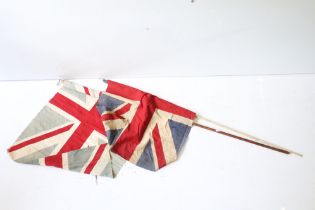 Two vintage cloth Union flags, with poles (measure approx 78cm x 55cm and 78cm x 59cm - excluding