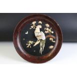 Japanese lacquered wall plaque of dished circular form, with applied bone and mother-of-pearl