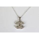 A silver and CZ designer style pendant necklace