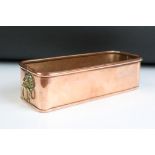 Copper rectangular planter, with twin lion mask handles, roller upper rim. Approx 30cm long