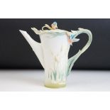 Franz porcelain tea pot having moulded kingfishers to the lid and handle with moulded bulrushes.