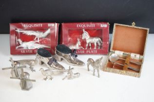 A small collection of silver plate to include donkeys, pheasants, windmills, pin cushion....etc..