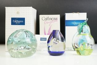 Three Caithness paperweights to include a Windfall pear paperweight, a golden jubilee regal