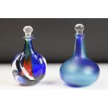 Two studio art glass bottles to include a frosted blue glass bottle signed Gail D Gill, and