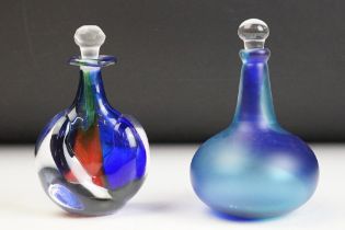 Two studio art glass bottles to include a frosted blue glass bottle signed Gail D Gill, and