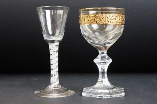 19th Century cordial glass with a double series air twist stem together with a faceted glass