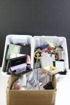 A very large collection of vintage and contemporary costume jewellery contained within three boxes.