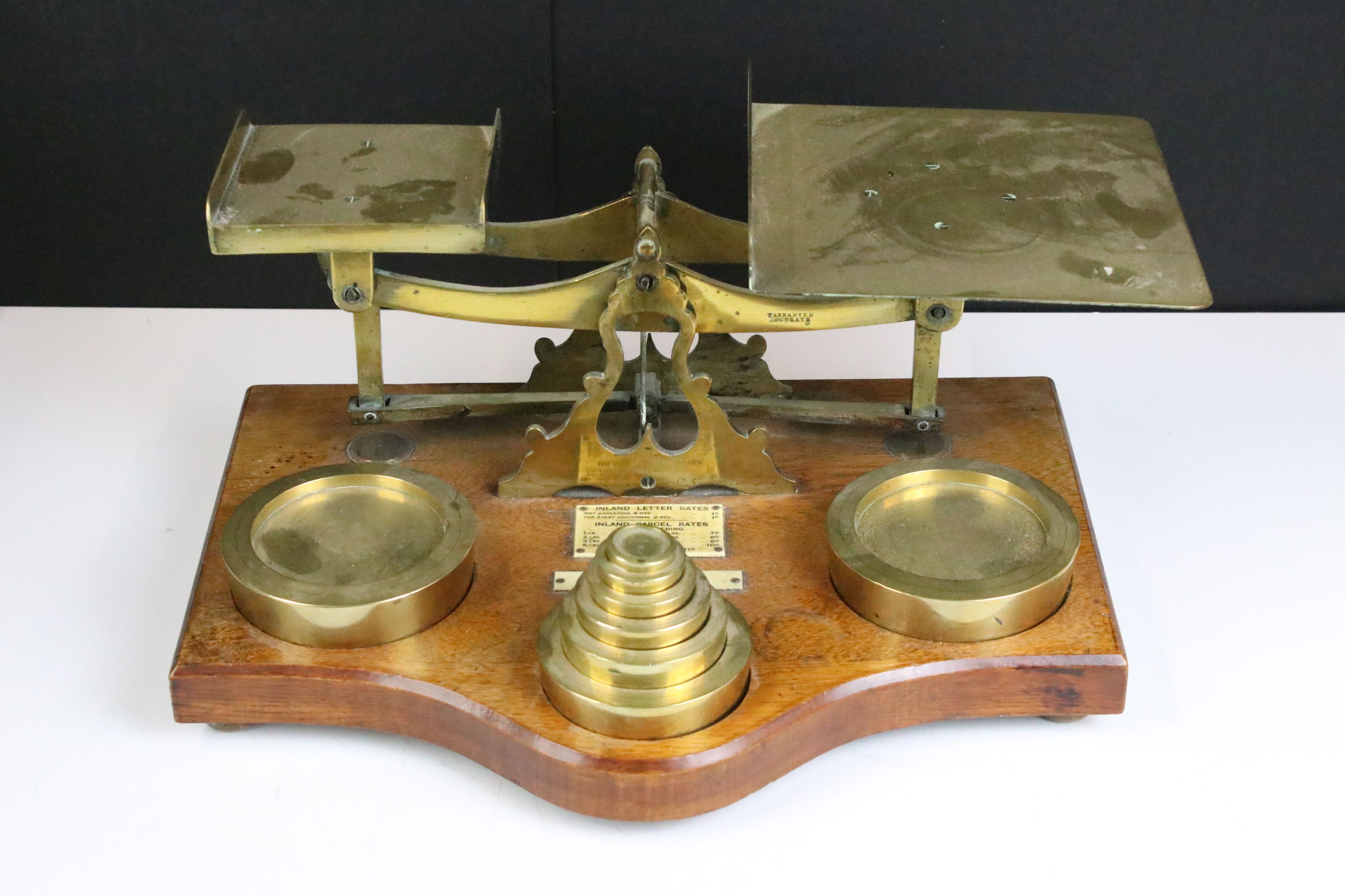 Set of brass inland postal scales, complete with weights (ranging from 1oz to 4lb), with ivorine