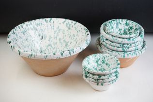 Collection of Italian ceramic terracotta bowls, each having a white glazed ground with green