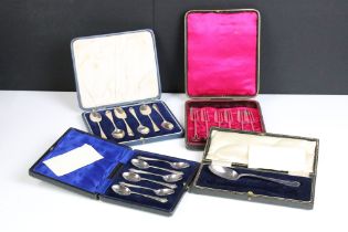 A cased set of sterling silver tea spoons together with a cased set of sterling silver coffee