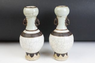 Pair of Chinese celadon crackle glaze vases. The vases having celadon glazed necks, crackle glazed