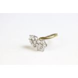 A gold plated on silver ring set with CZ flower heads