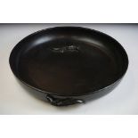 Large black ceramic centrepiece round dish having moulded raised crocodiles to the side and bowl.