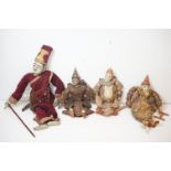 Four Thai carved wooden puppets, in embroidered & sequined traditional dress, to include Ganesha (