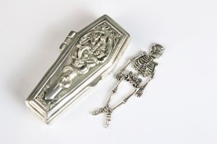 An unusual silver coffin shaped Vesta case with skeleton