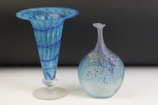 Two studio art glass vases to include a bottle vase with mottled and trailed detailing signed